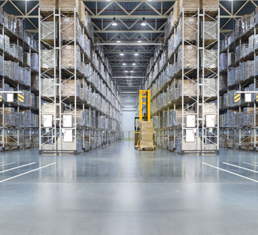 Huge distribution warehouse with high shelves